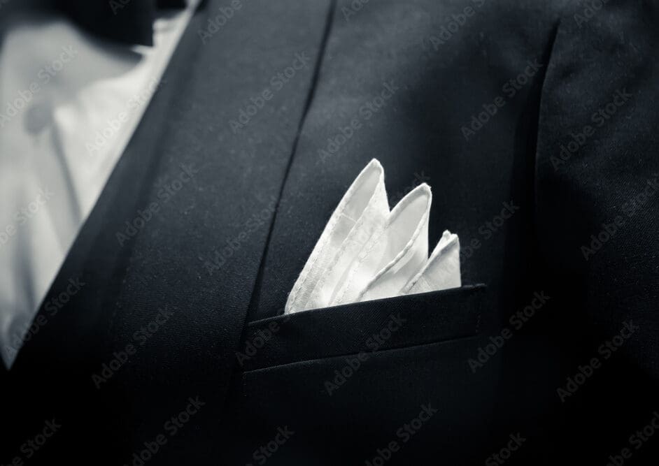 gentle man closeup groom tuxedo suit for luxury dinner black and white art tone.